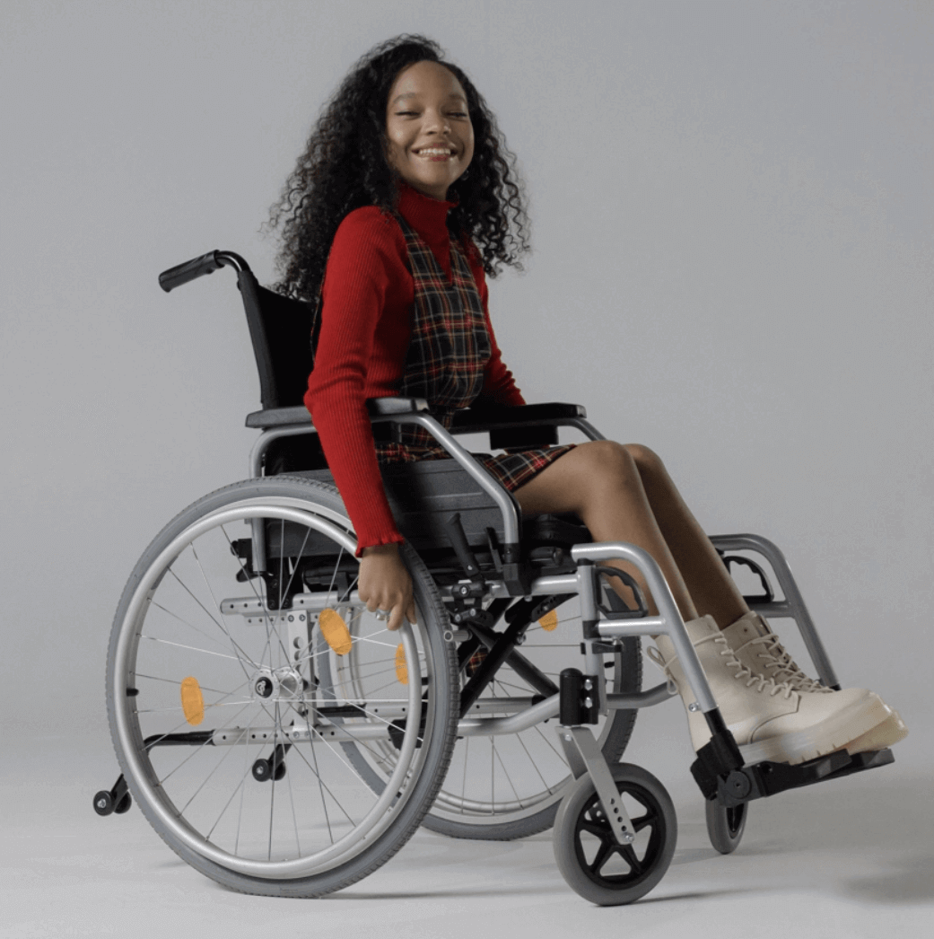 Happy girl in wheelchair